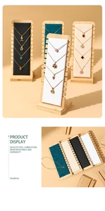 Macro detail of wooden necklace display stand with multi-slot slots for jewelry display