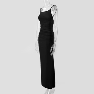 Detailed side view of black bodycon maxi dress with ruched pleats and side draping