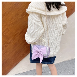 Toddler girl tweed crossbody bag in purple with large bow and pearl handle detail