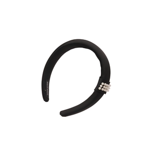 Elegant black satin padded headband featuring three rows of white pearls and handmade tag