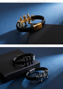 Detail of woven black leather bracelets with metallic nail charms in gold, black and silver