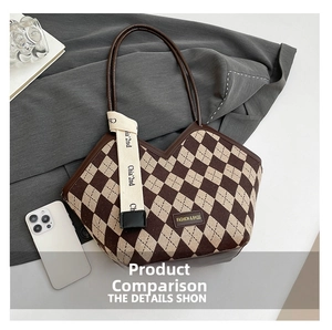 Detail view of vintage bucket bag featuring brown rhombic tweed and silk scarf accent