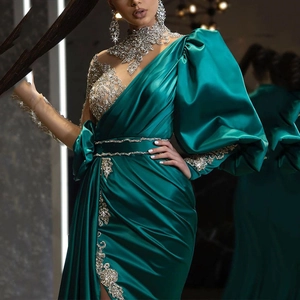 Elegant emerald green satin evening dress with silver sequin embroidery and one-shoulder puff sleeve