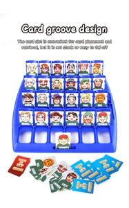 Detail of blue plastic board game base with 24 flip slots and cartoon character cards