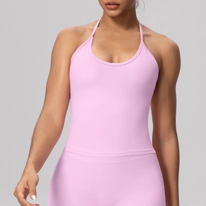 Detail of pink halter yoga tank top with built-in pads and quick-dry stretch fabric