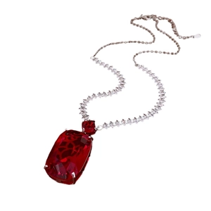 Elegant silver necklace featuring a large rectangular red faceted zircon pendant