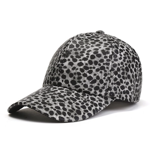 Stylish baseball cap featuring black and white leopard print with curved brim for outdoors