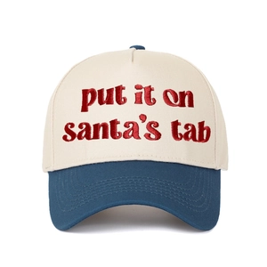 Detail of red 3D embroidery on blue and white Put It on Santa's Tab baseball cap