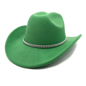 Detail of green felt western cowboy hat with sparkling rhinestone trim and wide brim