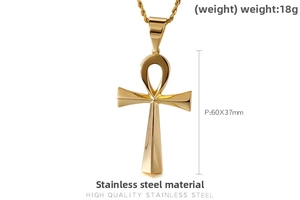 Detailed view of large gold polished stainless steel Ankh cross pendant with rope chain