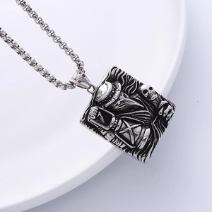 Gothic plague doctor and skull relief pendant on a steel box chain necklace