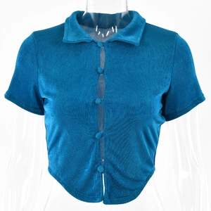 Detail view of teal short sleeve cardigan with lapel collar and single-breasted buttons