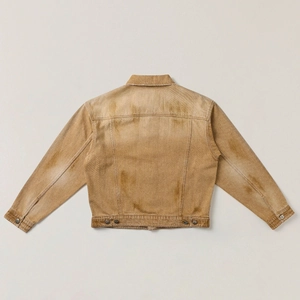 Rear view of brown washed denim jacket showing vintage worn texture and hem adjustments