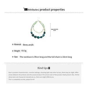 Detail view of double-layer acrylic necklace with green stone beads and 43cm drop length