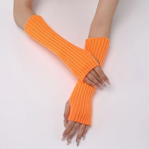Detailed close-up of bright orange ribbed knit arm warmers with fingerless design
