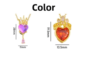 Detailed close-up of pink and purple heart-shaped crown pendants on titanium necklaces