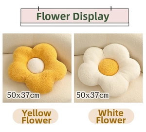 Detailed view of yellow and white 50x37cm flower-shaped textured plush sofa cushions
