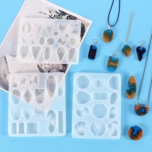 Top view of geometric silicone molds for resin earrings and pendant jewelry making
