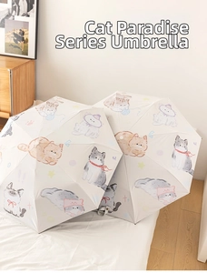 Detail of cute cat illustration on cream automatic umbrella with UV protection coating