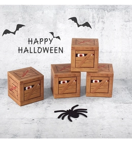 Brown wood-grain pirate treasure gift boxes with spooky eyes for Halloween decor