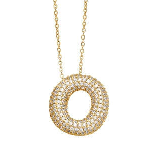 Macro view of golden doughnut necklace pendant encrusted with sparkling diamonds