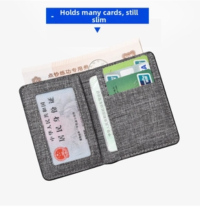 Slim canvas wallet showing multiple card slots and clear ID window for driver license