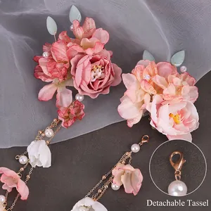 Hanfu hair clip with pink silk flowers, pearls, and detachable golden tassel chain