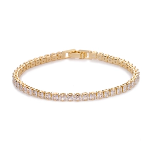 Detail of gold-plated tennis bracelet featuring square AAA zircons and a secure folding clasp