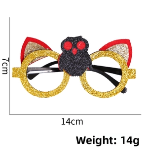 Detailed view of Halloween owl glasses with gold glitter frames and 14cm width measurement