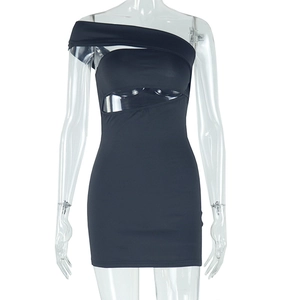 Detail of black one-shoulder dress with sexy waist cutout on a transparent mannequin