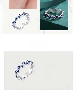 Macro detail of S925 sterling silver ring showing 3.1mm width and evil eye enamel design