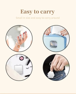 Foldable silver metal mirror keychain shown in hand, bag, and pocket for portable use
