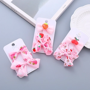 Pink handmade bow hair clips for kids with strawberry and cherry resin charms set