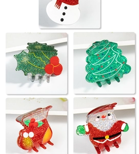 Close-up of glittery Christmas hair clips featuring snowman and festive tree shapes