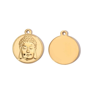 Detailed macro view of golden Buddha head pendant showing relief design and polished back