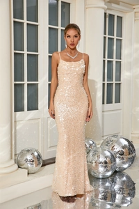 Detail of elegant backless champagne sequin evening gown with slim mermaid fishtail cut