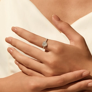 Elegant 50-carat heart-shaped moissanite S925 silver ring worn by a model