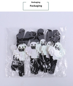 Bulk pack of white glittery ghost party favors with black felt straps for Halloween