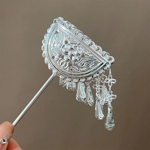 Detail of silver vintage Chinese hair stick with hollow crescent moon and long tassels