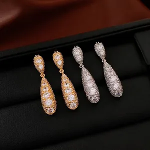 Elegant water drop tassel earrings with sparkling cubic zirconia in gold and silver finish
