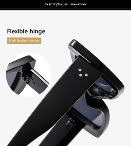 Close-up of flexible hinges and triple-dot rivets on black cat-eye sunglasses