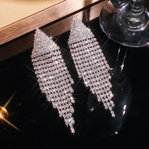 Elegant long crystal tassel drop earrings with silver rhinestone geometric design