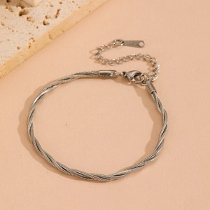 Detailed macro view of the silver multi-strand snake chain bracelet with lobster clasp
