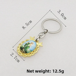 Saint Jude Thaddeus gold metal keychain with woven frame and religious portrait