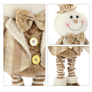Detail of Christmas snowman figurine with champagne gold suit and striped plush stockings