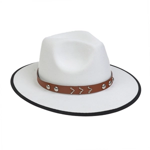 Detail of white felt fedora featuring brown leather band with silver metal bull-head accents
