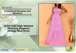 Detail view of pink high waist maxi dress featuring pleated bodice and tiered ruffle skirt