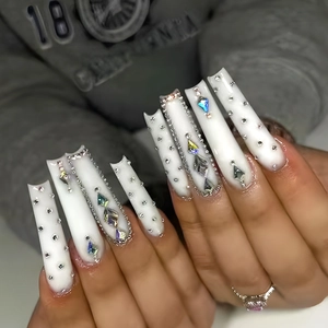Extra long square press-on nails in white with colorful rhinestones and silver beads