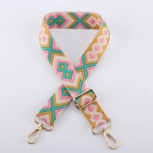 Close-up of adjustable 38mm woven shoulder strap with colorful geometric diamond pattern