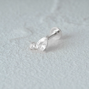 Close-up of S925 silver flat back stud featuring a teardrop and round cubic zirconia